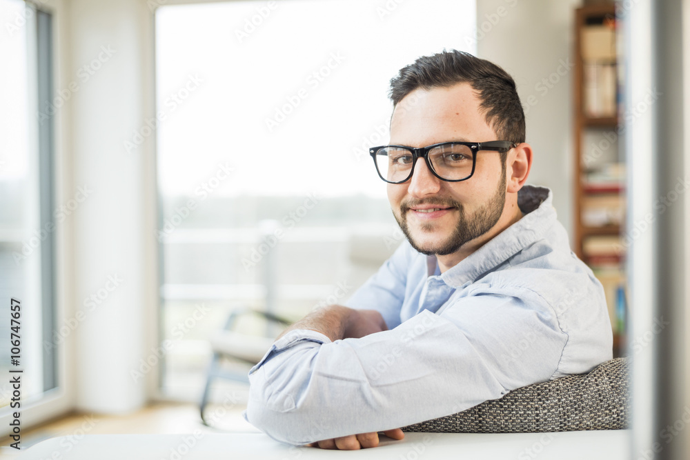 Portrait of smiling young man with glasses Portrait of smiling young man with glasses