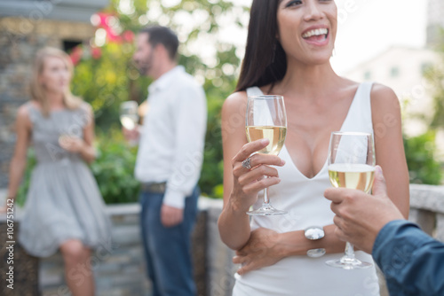 Beautiful smiling woman with glass of champagne