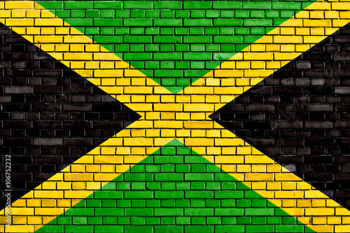 flag of Jamaica painted on brick wall