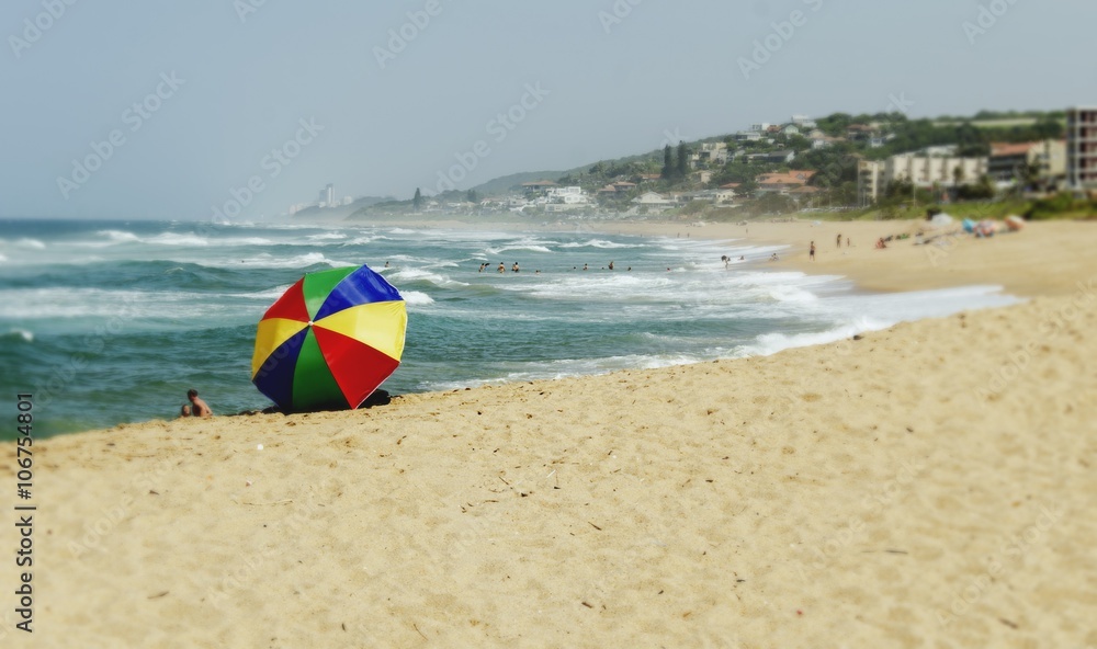 colorful umbrella on a sunny beach Ocean