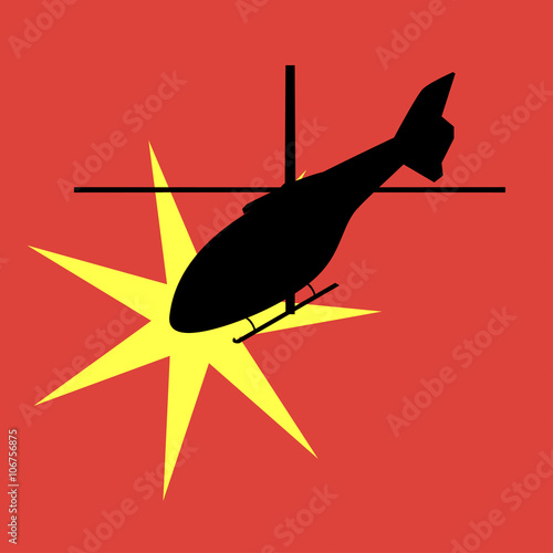silhouette of an exploding helicopter
