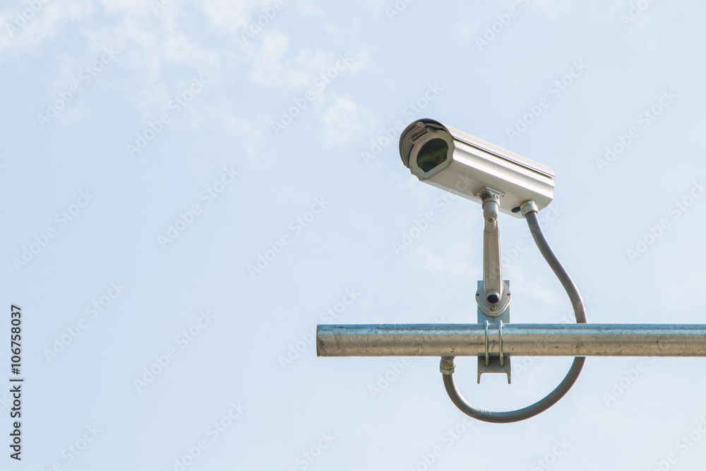 Security camera on blue sky background Security camera on blue sky background