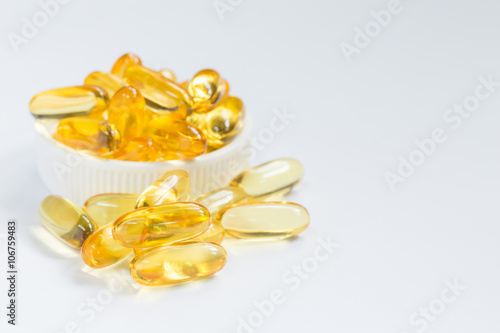 Fish oil capsule is nutrition food for healthy background with a copy space.