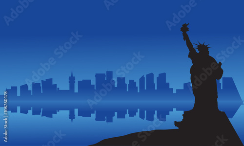 Silhouette of statue liberty from sea