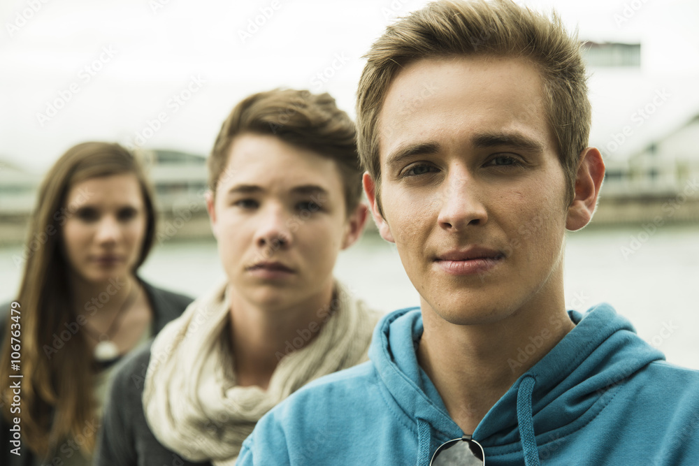 Portrait of three serious teenagers outdoors Portrait of three serious teenagers outdoors