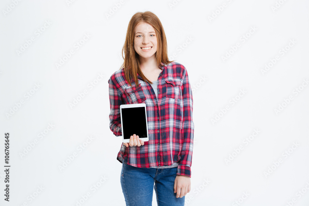Woman showing blank tablet computer screen Woman showing blank tablet computer screen