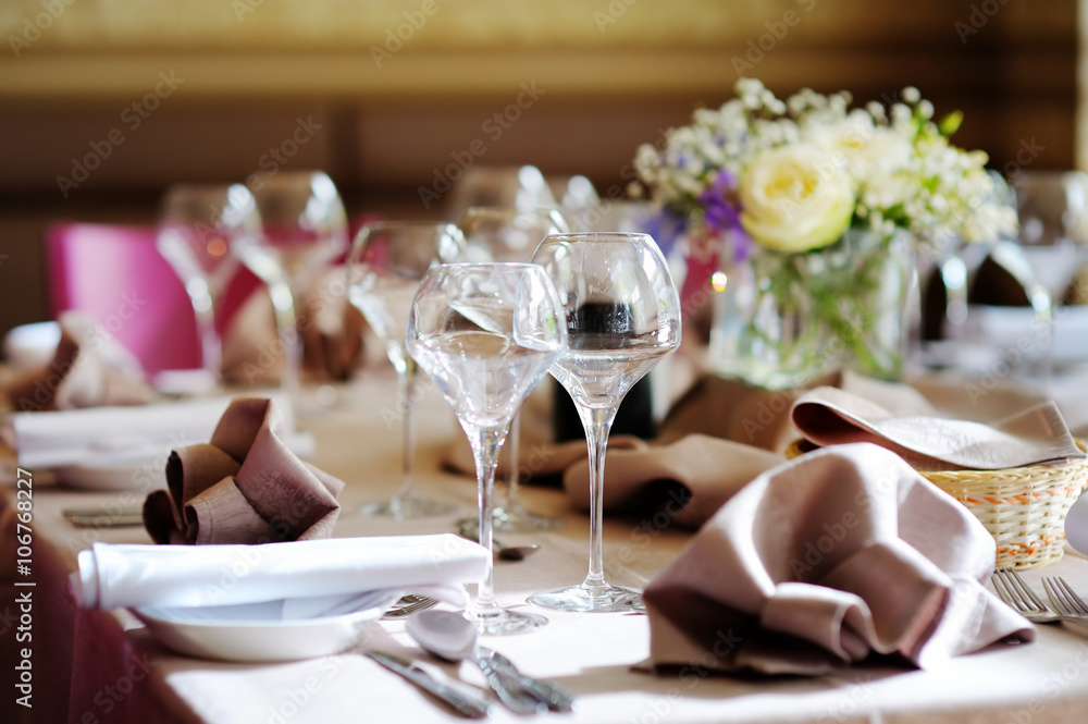 Beautiful table set for some festive event or wedding reception Beautiful table set for some festive event or wedding reception