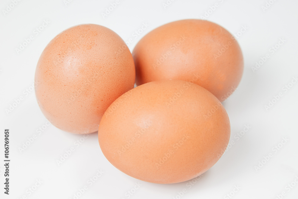 Three chicken eggs on a white background Three chicken eggs on a white background
