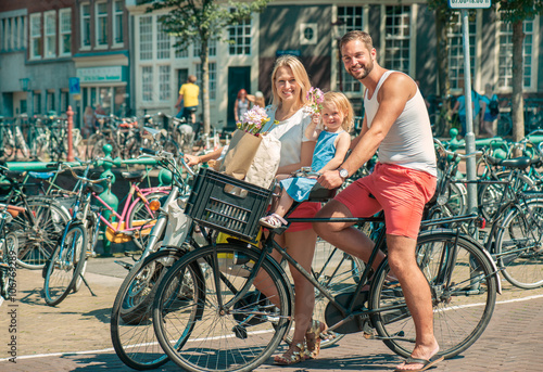 Canvas Print Riding bikes in Amsterdam