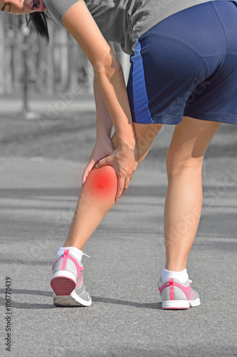 Cramps in leg calves or sprain calf on woman runner