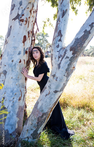 Bild auf Leinwand portrait of young lady in black dress