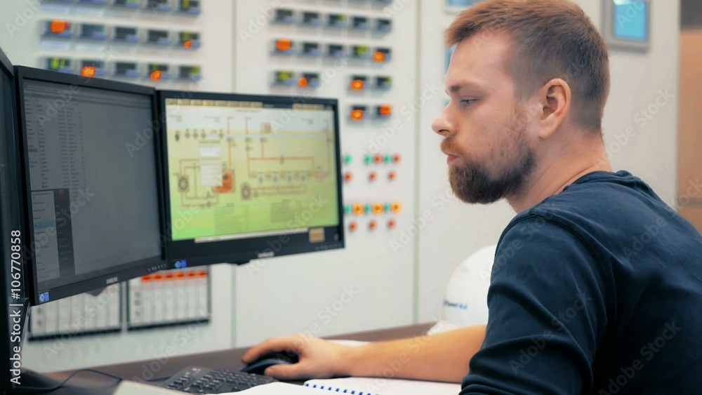 engineer computer controls the operation of machinery in the modern factory engineer computer controls the operation of machinery in the modern factory