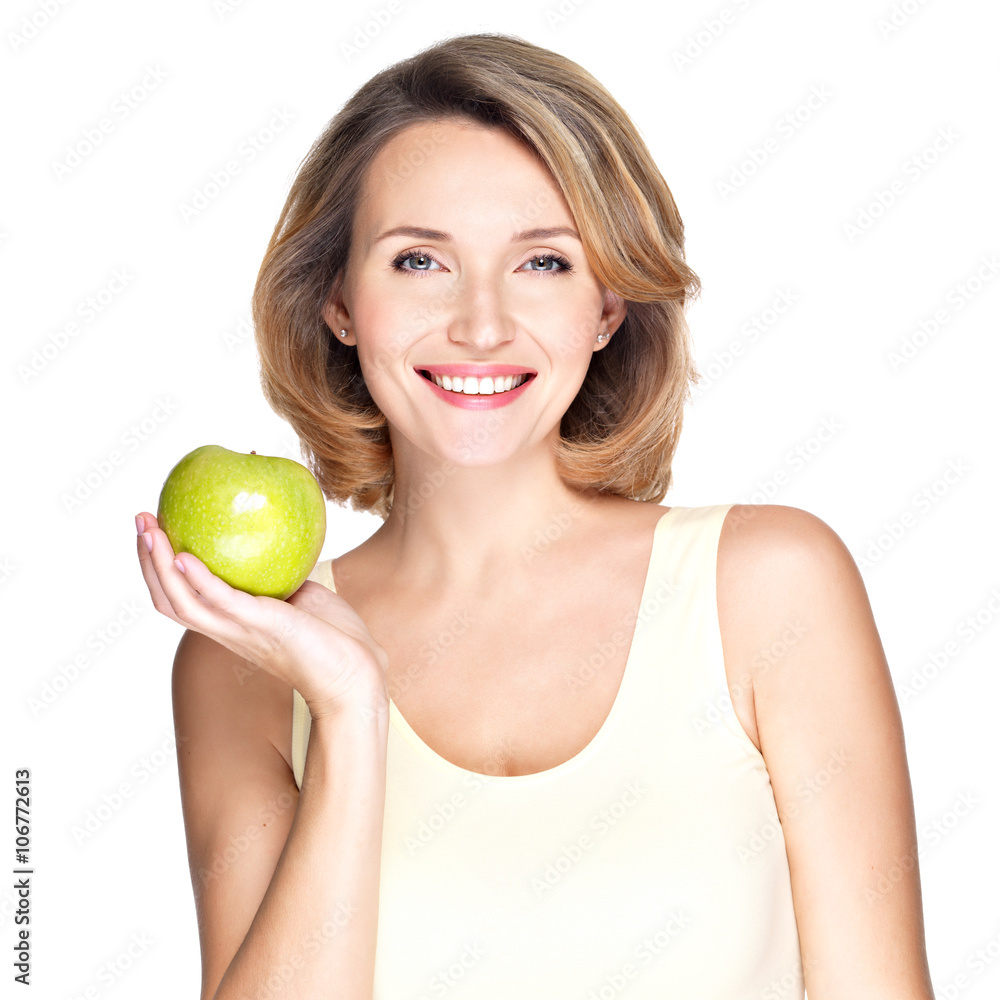 Young happy smiling woman with green apple. Young happy smiling woman with green apple.