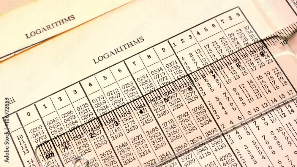 Close up of old logarithm tables. Looking at logarithm tables to make mathematical calculations.