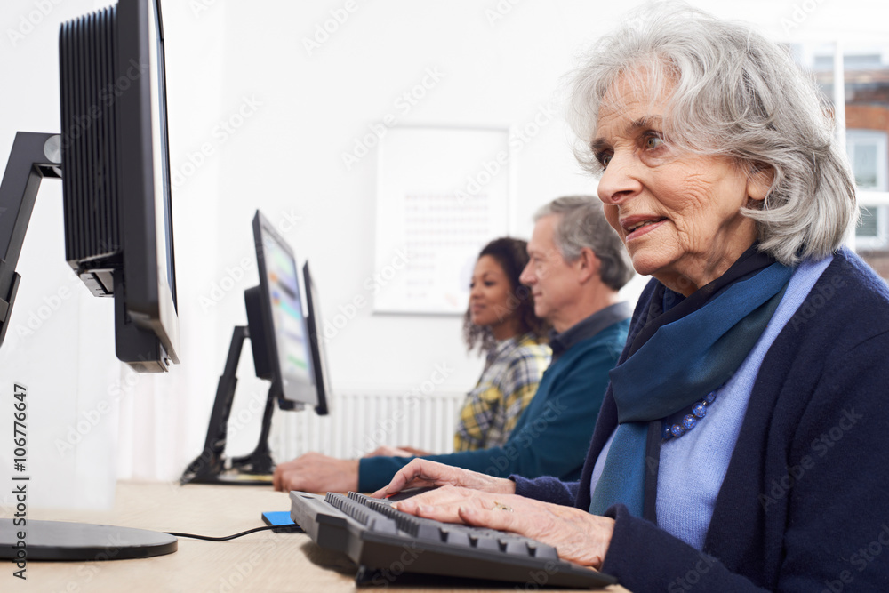 © highwaystarz - Senior Woman Attending Computer Class © highwaystarz - Senior Woman Attending Computer Class