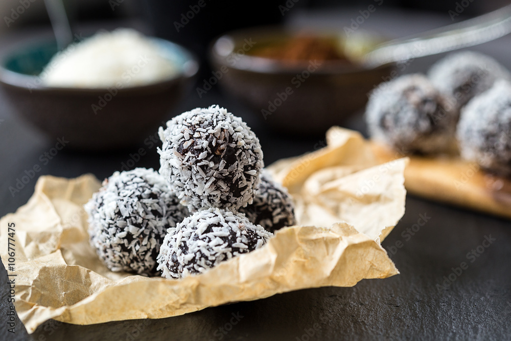Homemade Healthy Paleo Raw Chocolate Truffles with Nuts, Dates and Coconut Flakes