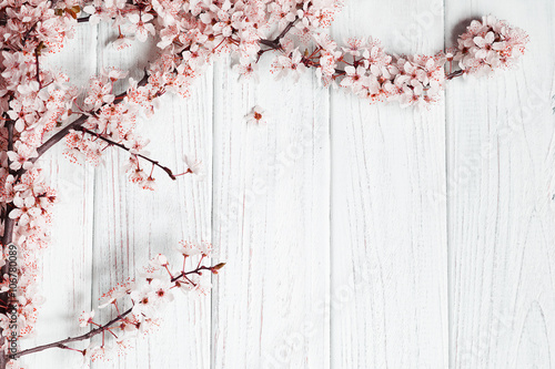 spring background. fruit flowers on wooden table