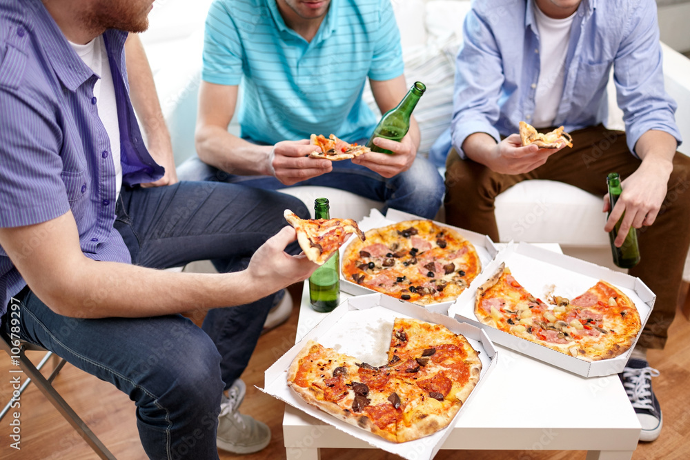 close up of friends with beer and pizza at home close up of friends with beer and pizza at home