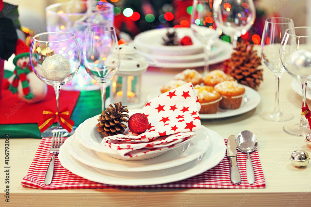 Christmas table setting with holiday decorations