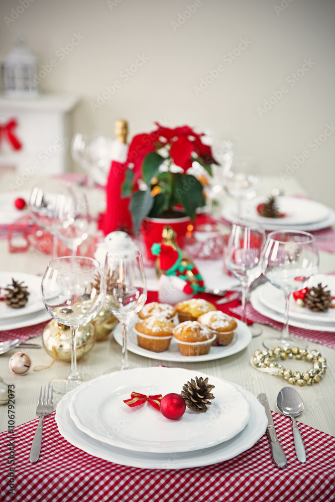 Christmas table setting with holiday decorations Christmas table setting with holiday decorations