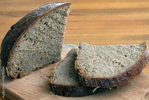 Black bread slices on the cutting board