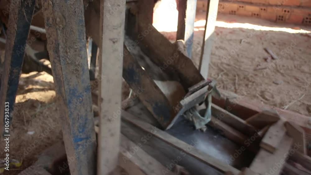 MCU old fashioned wooden rice processor in rural rice mill in Southeast Asia MCU old fashioned wooden rice processor in rural rice mill in Southeast Asia
