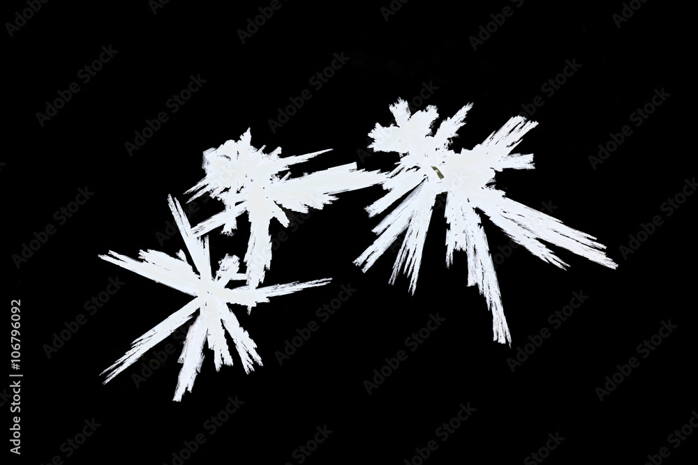 Crystals of ice on black background Crystals of ice on black background