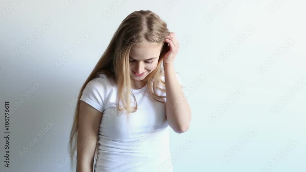beautiful sexy young girl posing in the studio on a white background beautiful sexy young girl posing in the studio on a white background