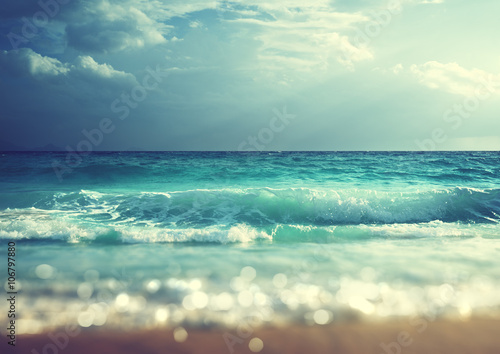 Foto beach in sunset time, tilt shift soft effect