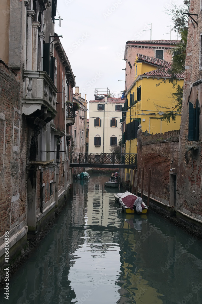 Rainy day. Narrow canal in Venice. Venice. Italy