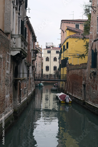 Rainy day. Narrow canal in Venice. Venice. Italy © evgenij84