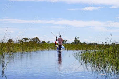 Man in a Makoro - Okavango Delta - Botswana