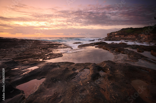 Yena Bay rockshelf low tide at dawn.