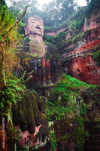 The 71m tall Giant Buddha (Dafo), carved out of the mountain in the 8th century CE, Leshan, Sichuan province photo