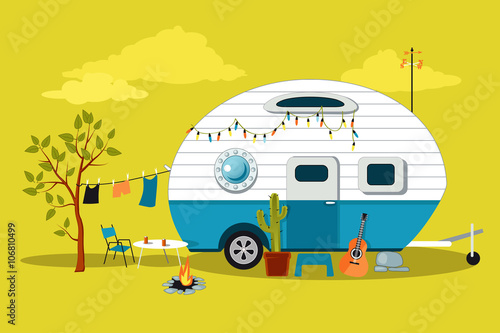 Cartoon travelling scene with a vintage camper, a fire pit, camping table and laundry line, EPS 8 vector illustration, no transparencies