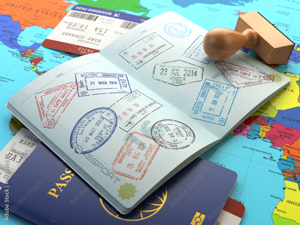Travel or turism concept. Opened passport with visa stamps with Travel or turism concept. Opened passport with visa stamps with