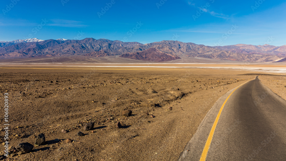 Road through canyons with lots of different topography. The road offers majestic views. It contains colorful rock formation. BADWATER RD, Death Valley National Park