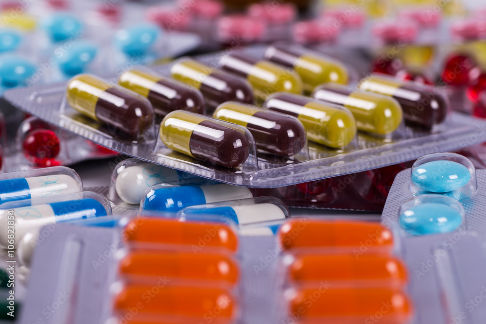 Selection of different pills in form of tablets and capsules Selection of different pills in form of tablets and capsules