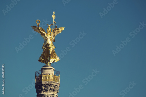 golden bronze sculpture (Goldelse) on the Victory Column (Siegessaeule), Berlin, Germany, Vintage Style 