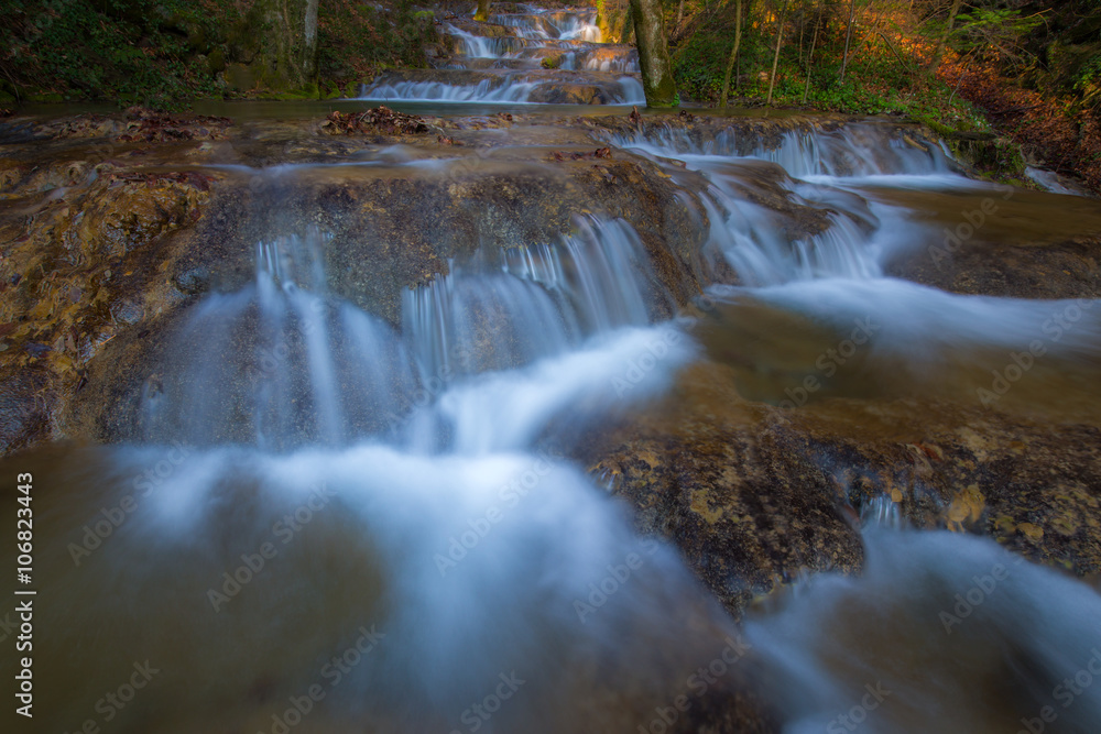 Beautiful waterfalls and mountain stream in Transylvania, in early spring Beautiful waterfalls and mountain stream in Transylvania, in early spring