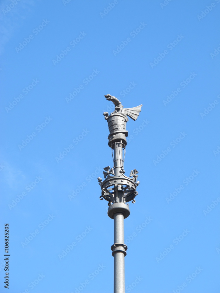 Dragon-shaped lamp post in front of Arco de Triunfo, Barcelona