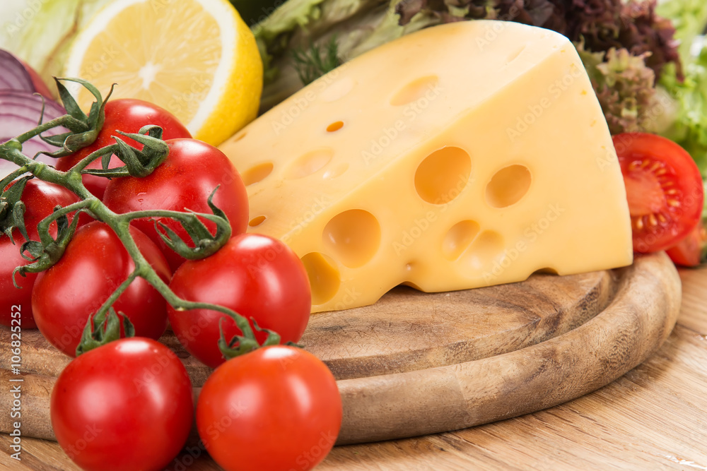 yellow cheese with fresh vegetables yellow cheese with fresh vegetables