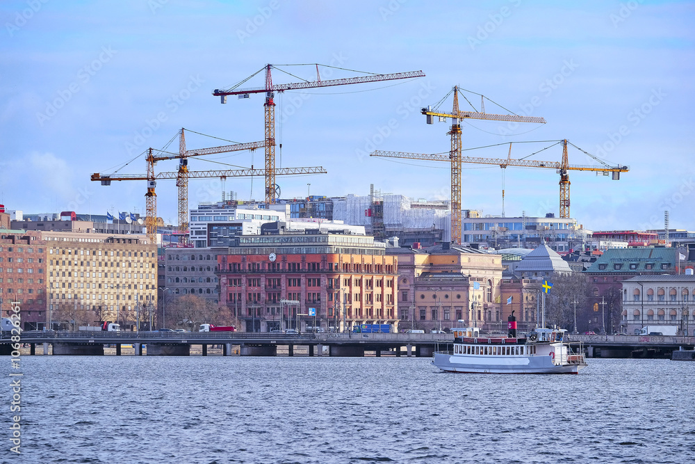 Fototapeta premium Stockholm, Sweden - March, 17, 2016: Panorama of Stockholm, Sweden with tower cranes