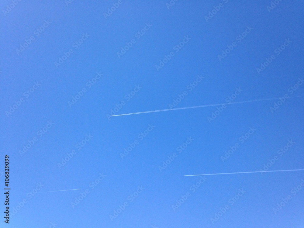 two jets in clear blue sky two jets in clear blue sky