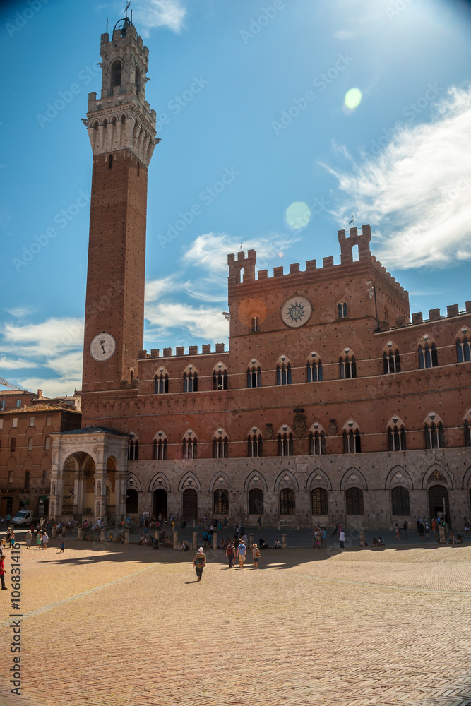 Panorama of Siena, Tuscany, Italy. Piazza del Campo with Palazzo Pubblico and its Torre del Mangia. Beautiful image of medieval italian town.