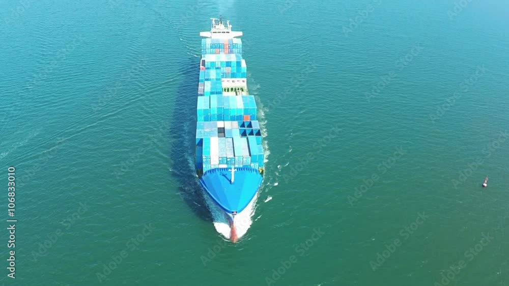 Cargo container trade ship in open sea ocean, AERIAL VIEW Cargo container trade ship in open sea ocean, AERIAL VIEW