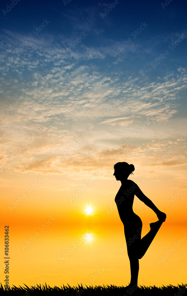 Yoga pose at sunset