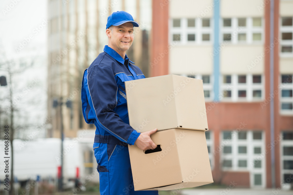 Delivery Man Carrying Cardboard Box