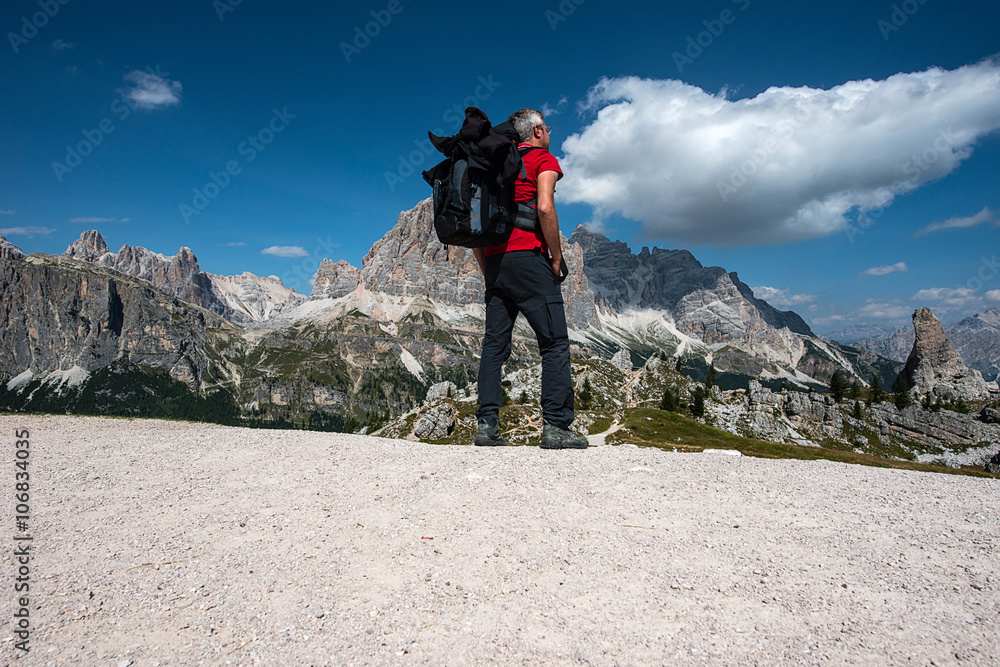 Trekker is watching at Le Tofane, Dolomites