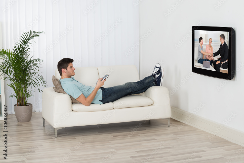 Young Man Watching Television